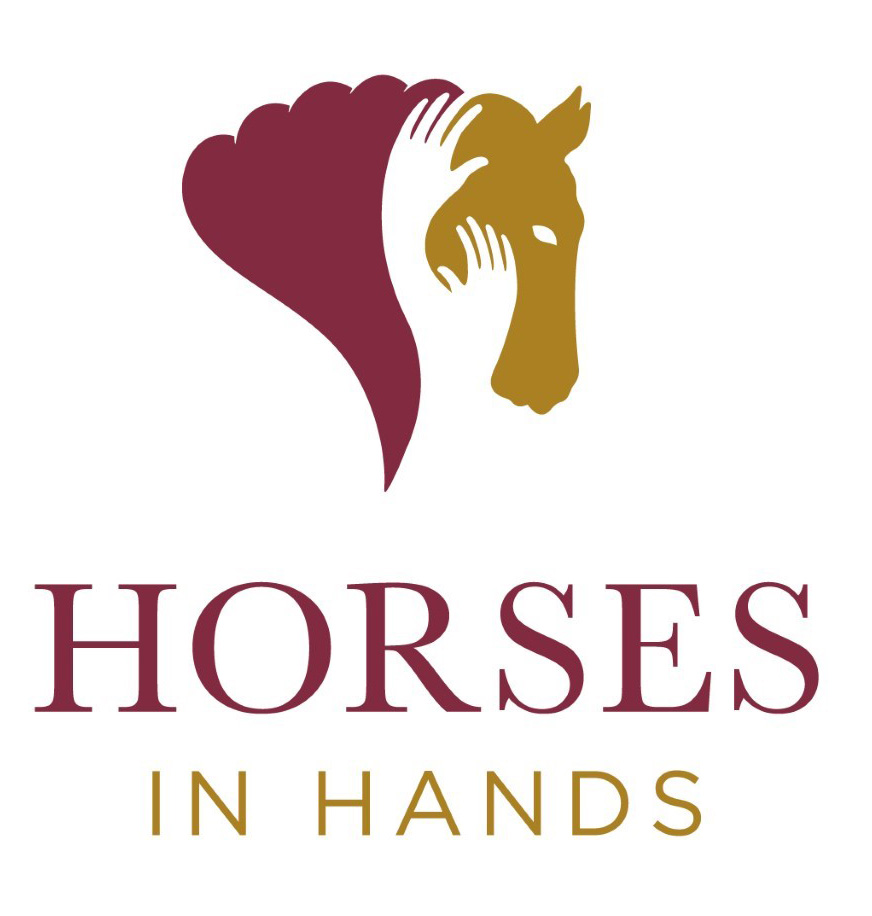 Horses in hands